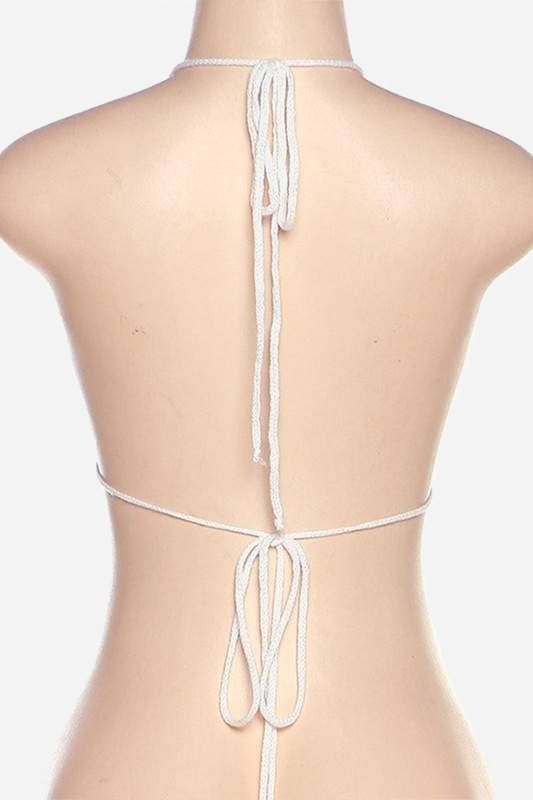 Back of the Waves of Color crochet bralette on a form, showing the white string halter neck tie and the tie-back band