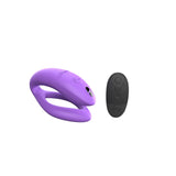 c-shaped hands-free wearable vibrator in lilac velvet color and a black external remote