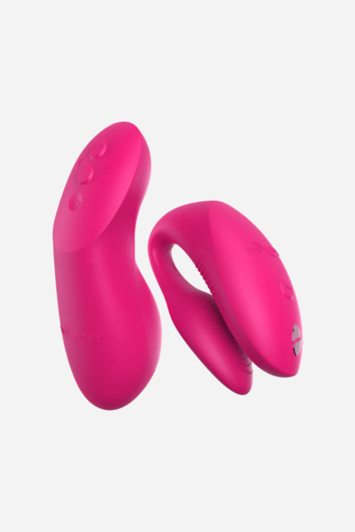 We-Vibe Chorus Pro couples vibrator in Hot Pink, showing the C-shaped wearable vibe beside its squeeze-control remote on grey