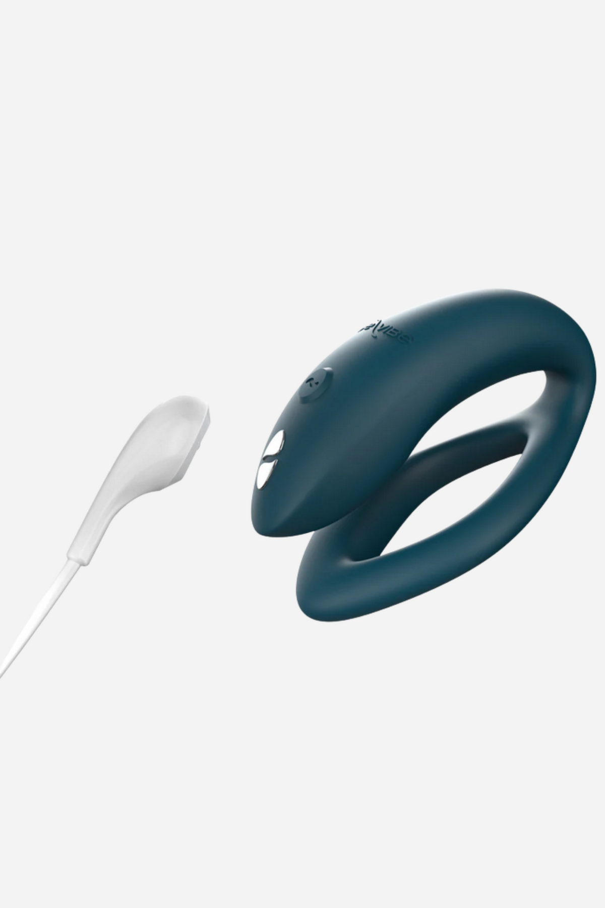 Green velvet We-Vibe Sync O shown with its white magnetic USB charging cable attached, ready to recharge between sessions, on light grey