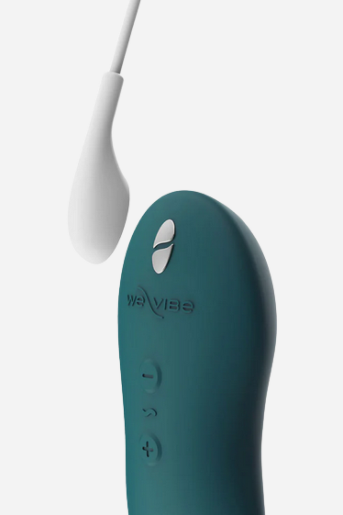 Close-up of the green velvet We-Vibe TouchX with its white magnetic charging cable about to connect to the charge point near the top