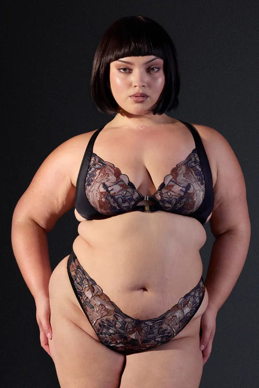 Plus-size model in the Wild Chanterelle Dreams embroidered thong in black with matching embroidered plunge bra, front view