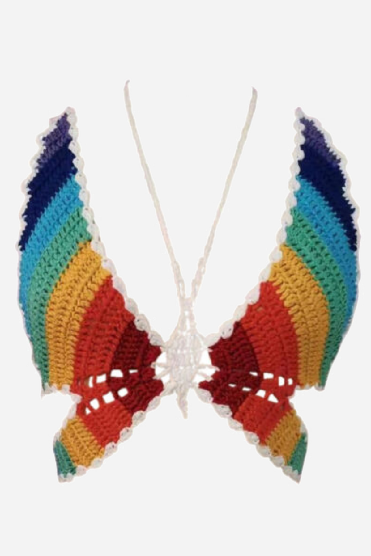 The rainbow crochet butterfly top laid flat with its wings spread wide, rainbow bands edged in white and long white halter ties at the neck.