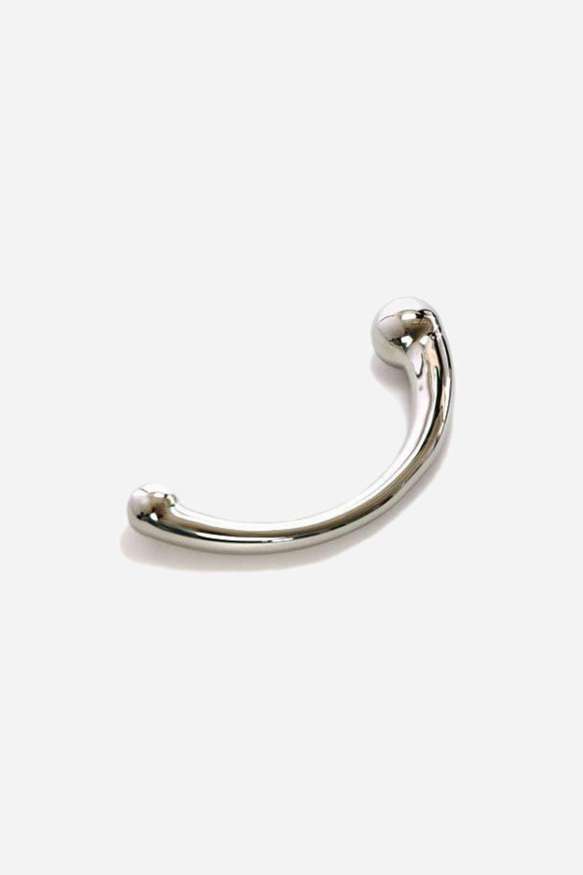 The Pure Wand photographed from the other side, showing the deep curve of the steel shaft and the smaller rounded ball end in front