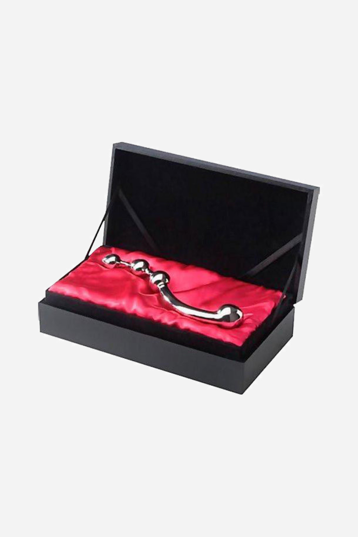 The steel wand presented inside its black hinged gift box, resting on red satin lining with the lid open to show the contents.
