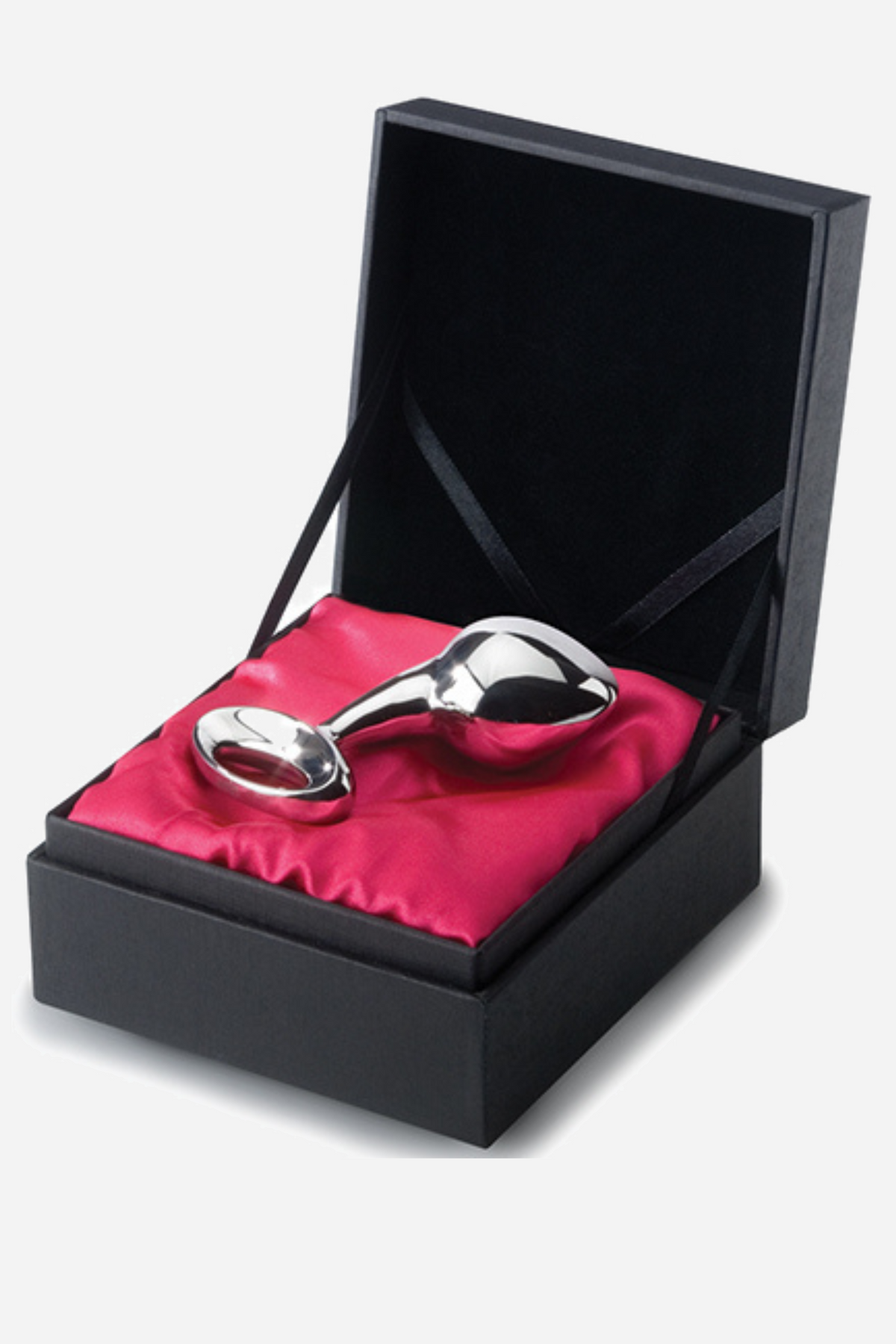 The large njoy stainless steel plug in its black presentation box on a pink satin lining
