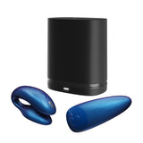 c-shaped hands-free wearable vibrator in navy blue with matching remote and black storage case