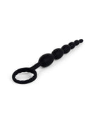 alternative angle focused on pull handle of black silicone anal beads