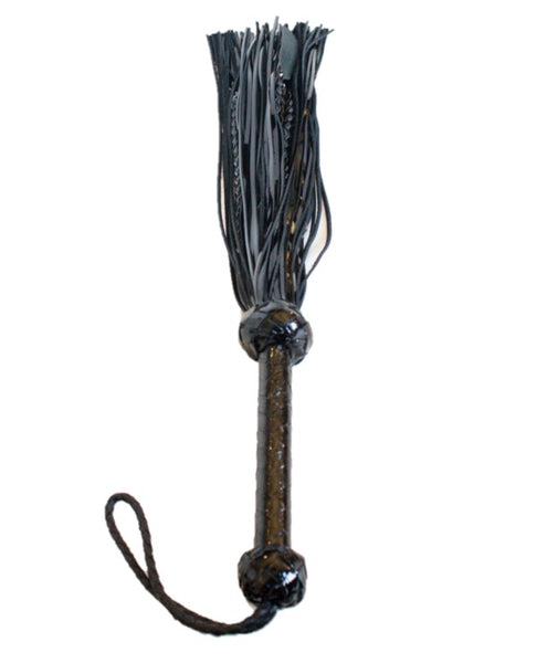 patent leather flogger with braided tails hidden in the falls, this super stingy flogger hurts so good