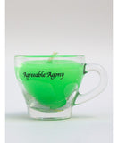 mini espresso glass cup with neon uv reactive candle inside for kinky wax play. sticker says agreeable agony
